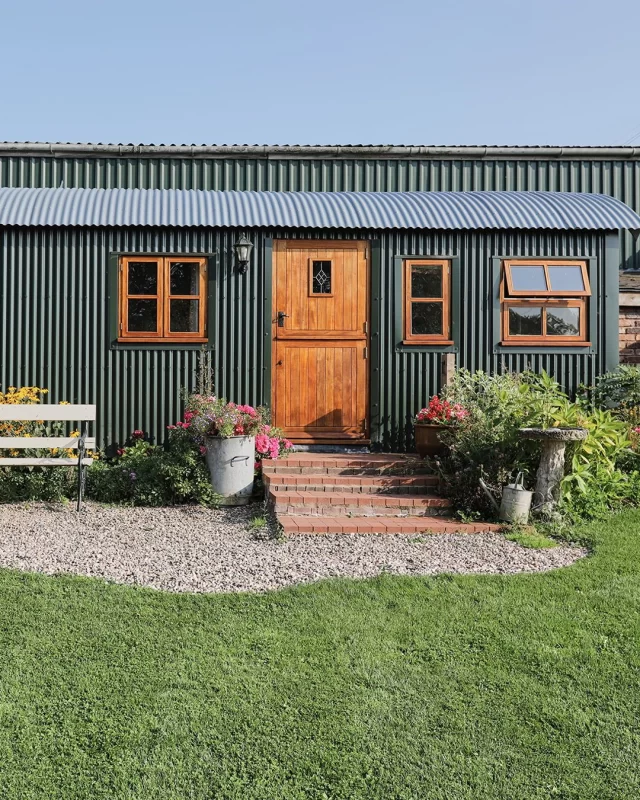 Our Shepherds Lodge is the epitome of luxurious glamping, nestled in the serene surroundings of Morrells Wood Farm.  As the largest of our four huts, the Shepherds Lodge offers an unparalleled glamping experience. Its spacious design thoughtfully incorporates all the amenities one could desire, making it the perfect ‘home from home’ for those seeking a longer holiday retreat☀️.  Tastefully decorated with an emphasis on tranquility and relaxation, every detail of Shepherds Lodge has been carefully curated to ensure a peaceful stay 💤.  Enjoy restful nights in a separate bedroom 🛏️ featuring a beautiful iron-framed bed. The decor is elegant yet cozy, providing a perfect sanctuary for relaxation, whilst the quaint living area seamlessly integrates with a modern painted kitchen, to offer a light and airy space to relax and unwind, and the well-appointed shower room 🚿 adds to the convenience and comfort of your stay.  🌳 Outside is equally as delightful, boasting a purpose-built brick barbeque set in a palatial garden. A patio complete with a table, chairs, and a bench is the ideal spot to soak in the refreshing countryside air and enjoy al fresco dining. The stunning views and tranquil setting will truly make you feel on 'top of the world.'  Whether you're seeking a peaceful retreat or an adventurous escape, the Shepherds Lodge at Morrells Wood Farm promises an unforgettable glamping experience filled with luxury, comfort, and the beauty of nature.  🗓️ Currently, we have availability throughout May, so be sure to book today or risk missing out!