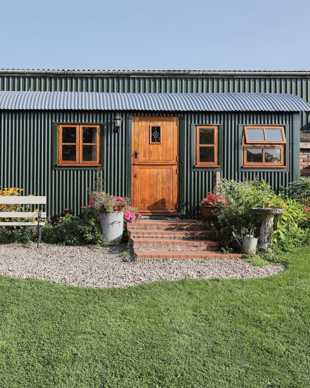 💚 Always a popular choice for couples, Shepherds Lodge is the epitome of luxurious glamping, nestled in the serene surroundings of Morrells Wood Farm.  As the largest of our four huts, the Shepherds Lodge offers an unparalleled glamping experience. Its spacious design thoughtfully incorporates all the amenities one could desire, making it the perfect ‘home from home’ for those seeking a longer holiday retreat☀️.  Tastefully decorated with an emphasis on tranquility and relaxation, every detail of Shepherds Lodge has been carefully curated to ensure a peaceful stay 💤.  Enjoy restful nights in a separate bedroom 🛏️ featuring a beautiful iron-framed bed. The decor is elegant yet cozy, providing a perfect sanctuary for relaxation, whilst the quaint living area seamlessly integrates with a modern painted kitchen, to offer a light and airy space to relax and unwind, and the well-appointed shower room 🚿 adds to the convenience and comfort of your stay.  🌳 Outside is equally as delightful, boasting a purpose-built brick barbeque set in a palatial garden. A patio complete with a table, chairs, and a bench is the ideal spot to soak in the refreshing countryside air and enjoy al fresco dining. The stunning views and tranquil setting will truly make you feel on 'top of the world.'  Whether you're seeking a peaceful retreat or an adventurous escape, the Shepherds Lodge at Morrells Wood Farm promises an unforgettable glamping experience filled with luxury, comfort, and the beauty of nature.  🗓️ Currently, the next weekend availability we have is a check-in date of Friday 20 June, so don't delay and book today or risk being very dissapointed!